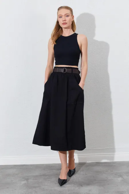 Jupe en gabardine noire pour femme, avec ceinture et poches avant