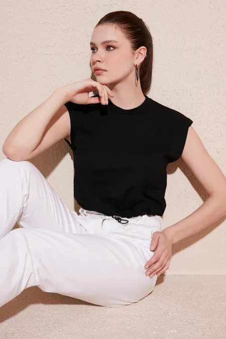 Jupe noire pour femme avec t-shirt Supreme à manches tombantes