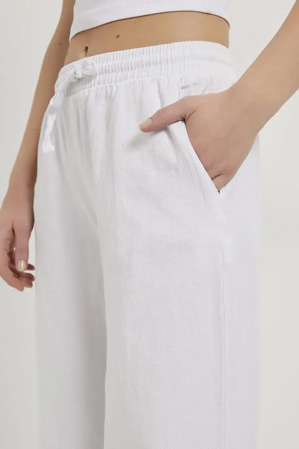 Kadın Beyaz Beli Bağlamalı Geniş Piş Dikişli Paça Pantolon