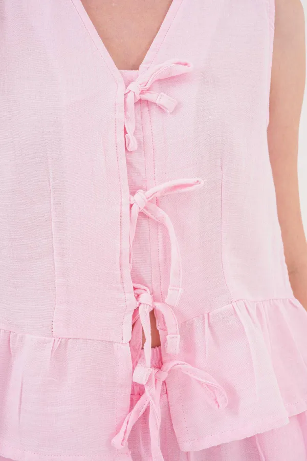 Kadın Pembe Önü Bağlamalı Kolsuz Eteği Fırfırlı Muslin Bluz