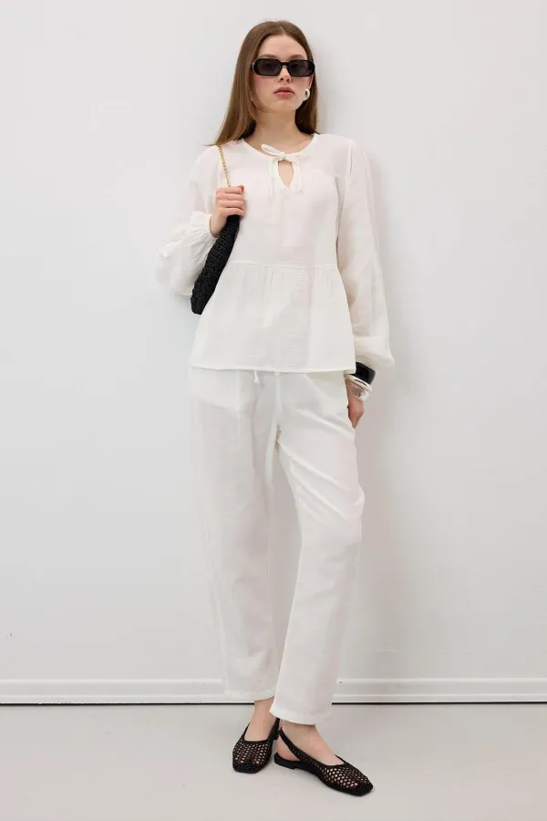 Women's Off-White Muslin Pants with Elastic Waist and Carrot Leg