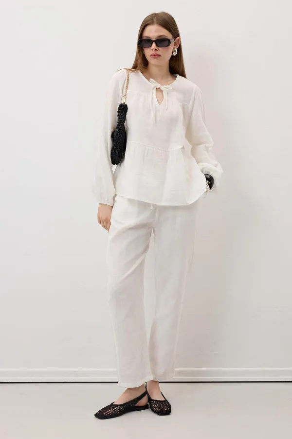 Women's Off-White Muslin Pants with Elastic Waist and Carrot Leg