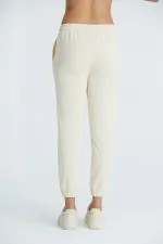 Pantalon de survêtement basique pour femme en lycra 2 fils, coupe classique, avec poignets élastiqués