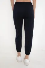 Pantalon de survêtement bleu marine pour femme, avec taille et chevilles élastiques