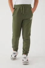 Pantalon de survêtement pour filles en tissu 3 fils avec poches, taille et chevilles élastiques, et motif imprimé