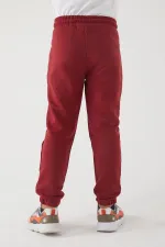 Pantalon de survêtement pour filles en tissu 3 fils avec poches, taille et chevilles élastiques, et motif imprimé