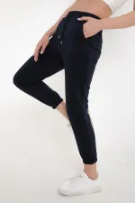 Pantalon de survêtement bleu marine pour femme, avec taille et chevilles élastiques