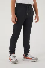 Pantalon de survêtement pour filles en tissu 3 fils avec poches, taille et chevilles élastiques, et motif imprimé