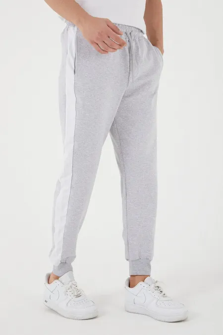 Pantalon de survêtement classique pour homme avec ourlets côtelés sur les côtés et poches