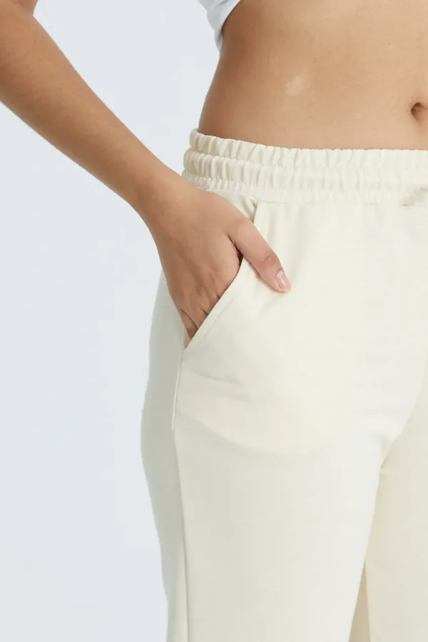 Pantalon de survêtement basique pour femme en lycra 2 fils, coupe classique, avec poignets élastiqués