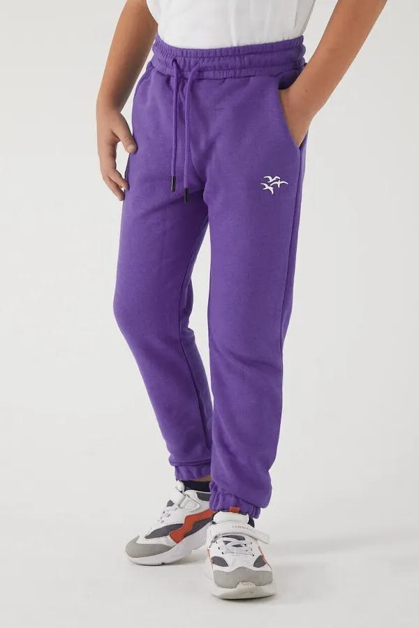 Pantalon de survêtement pour filles en tissu 3 fils avec poches, taille et chevilles élastiques, et motif imprimé