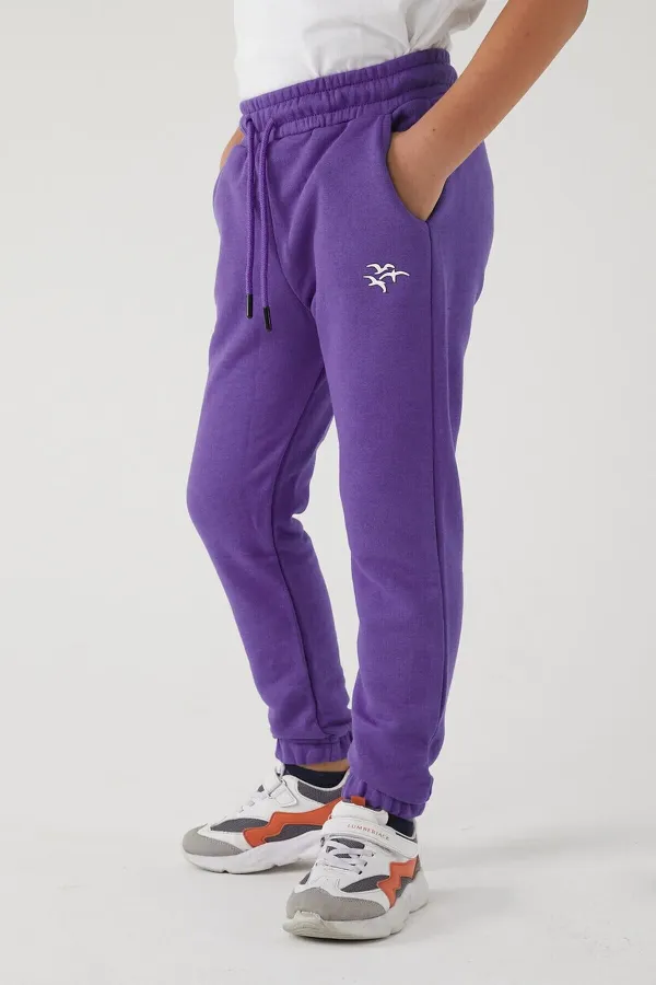 Pantalon de survêtement pour filles en tissu 3 fils avec poches, taille et chevilles élastiques, et motif imprimé