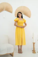 Robe festonnée à boucles