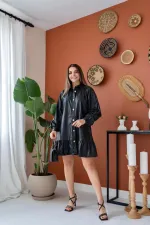 Robe en cuir avec jupe plissée