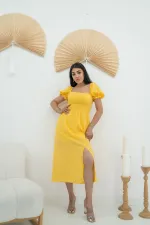 Robe festonnée à boucles