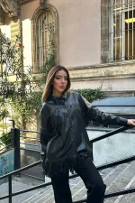 Chemise en cuir à pompons