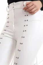 Leggings en cuir brodés de pierres