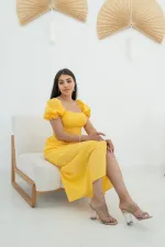 Robe festonnée à boucles