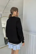 Pull en tricot perlé zigzag