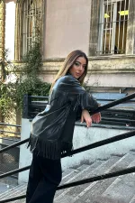 Chemise en cuir à pompons