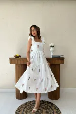 Zero Sleeve Ruffle Dress