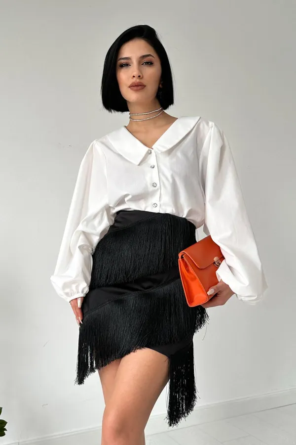 Jupe en satin à pompons