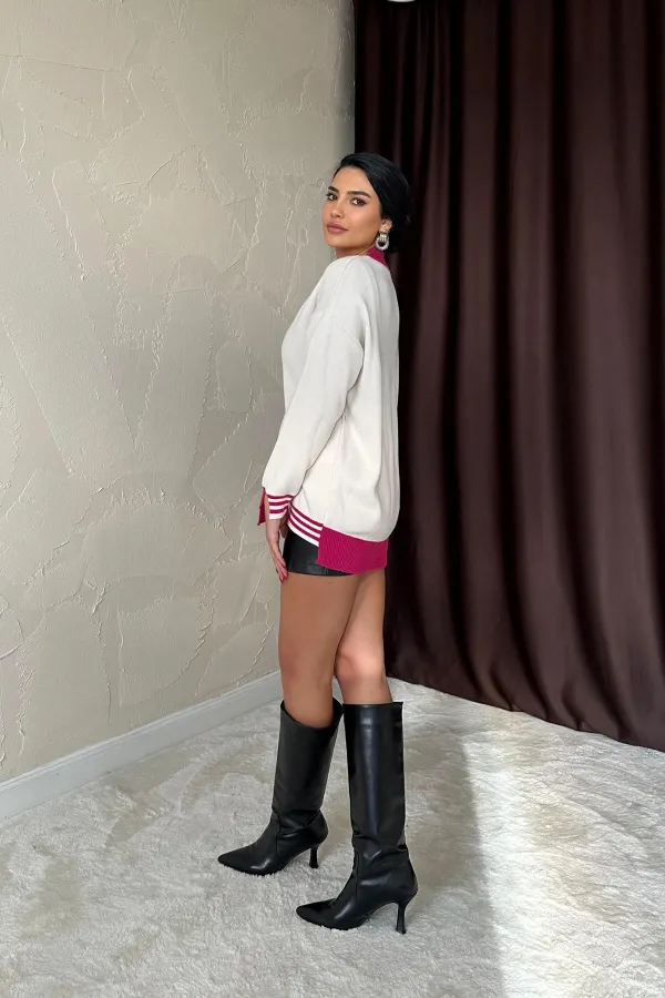 Pull tricoté avec garniture de col et de poignet