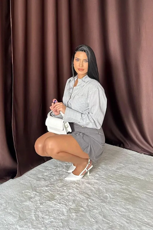 Pleated Skirt with Button Detail