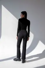 Pantalon évasé taille haute style espagnol