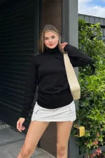 Chemisier à col roulé ample en maille