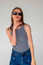 Débardeur sans manches à rayures côtelées et col halter