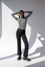 Pantalon évasé taille haute style espagnol