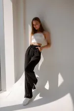 Pantalon de survêtement taille haute en lycra avec fente