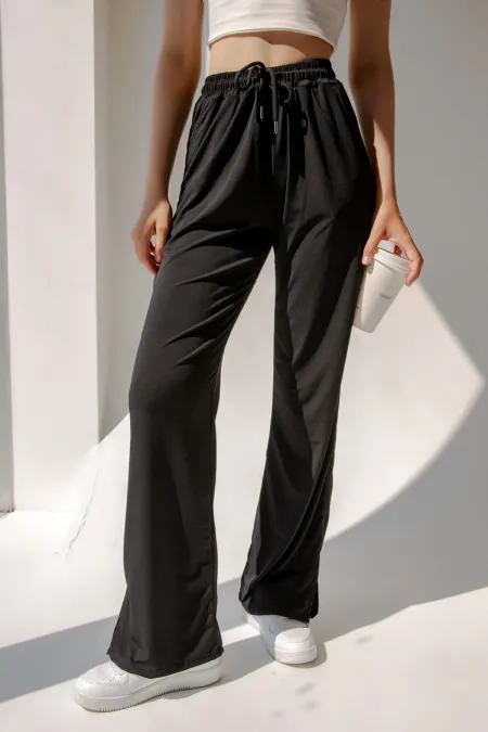 Pantalon de survêtement taille haute en lycra avec fente