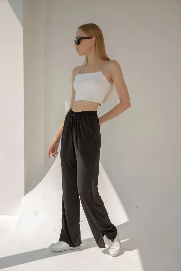 Pantalon de survêtement taille haute en lycra avec fente