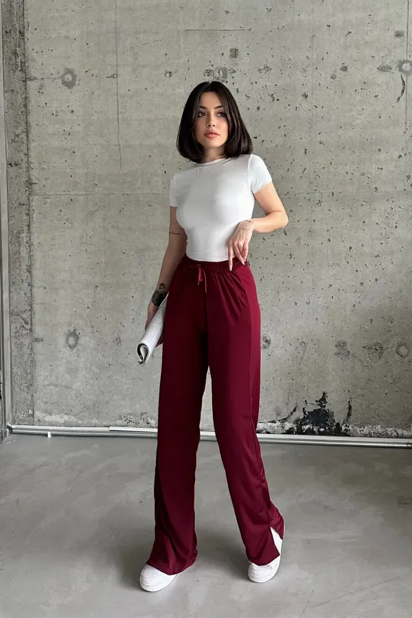 Pantalon de survêtement taille haute en lycra avec fente