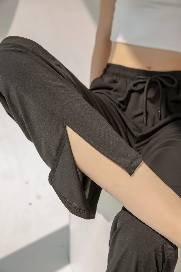 Pantalon de survêtement taille haute en lycra avec fente