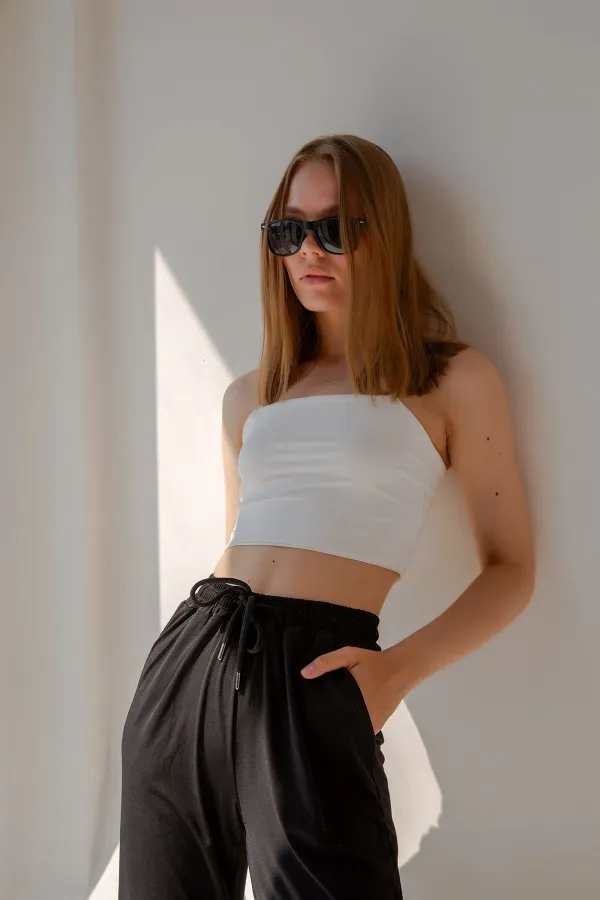 Pantalon de survêtement taille haute en lycra avec fente