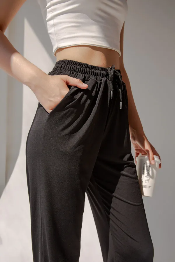 Pantalon de survêtement taille haute en lycra avec fente