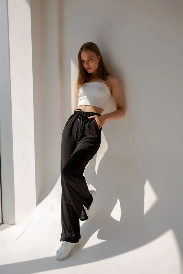 Pantalon de survêtement taille haute en lycra avec fente