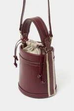 Sac seau à coutures contrastées bordeaux, porté main ou bandoulière