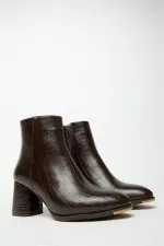 Bottes et bottines en crocodile marron