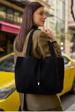 Sac à main et à bandoulière en daim souple avec détails en dentelle et daim noir