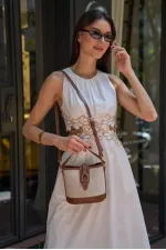Sac à main et bandoulière à boucle au design moderne en toile beige