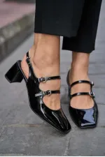 Chaussures à talons ouvertes en cuir verni noir avec détail de bande