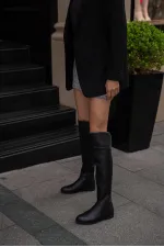 Bottes longues en cuir noir pour femme avec détails en pierre