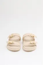 Chaussons tendance à double boucle crème