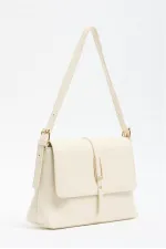 Sac à main et bandoulière crème avec boucle dorée détaillée Sac à main et bandoulière crème avec boucle dorée détaillée