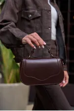 Sac à bandoulière marron avec housse