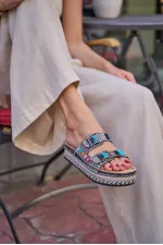Chaussons à plateforme avec boucle et détails en pierres et perles, noirs